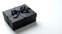 Elegant black gift box with satin ribbon bow isolated on white background for luxury packaging, special occasions, holidays and premium present wrapping.
