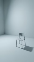 Single gray chair in minimalist white room with soft natural light casting shadow, suitable for concepts of solitude, waiting, emptiness, and interior design projects.