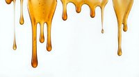 Dripping honey isolated on white background, perfect for food packaging, recipe blogs, and culinary design projects.