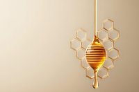 Golden honey dripping from a wooden dipper with honeycomb structure on beige background, copy space for natural food and organic product design.