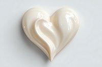 Glossy cream heart shape with swirled pattern isolated on white background for romantic design projects and Valentine decorations.