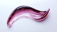 Elegant curved pink glass shape with smooth flowing lines and transparent glossy surface against light background, creating dynamic movement and artistic form.