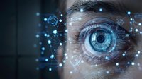 Futuristic human eye with digital network overlay, glowing blue cyber elements, biometric scanning concept for technology and security projects.