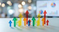 Colorful upward arrows on office desk representing business growth, success metrics, and financial progress with blurred corporate background for presentations.