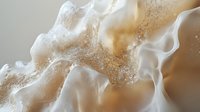 Ethereal white and beige abstract fluid art with organic flowing shapes and delicate textures creates dreamy atmospheric background for luxury designs.
