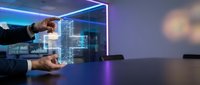 Businessman interacting with futuristic holographic building model using advanced augmented reality technology in modern office environment for architectural planning.
