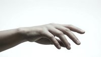Elegant human hand with extended fingers in graceful gesture on clean white background, isolated for design projects and creative applications.