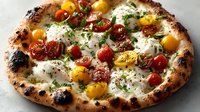 Artisan pizza with fresh mozzarella, colorful cherry tomatoes, herbs on rustic wood-fired crust. Gourmet Italian cuisine for restaurant menus and food blogs.