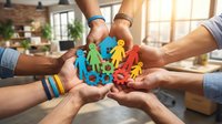 Diverse group of people holding colorful paper cutout figures together in circle, symbolizing teamwork, unity, community support and collaborative partnership in modern office environment.