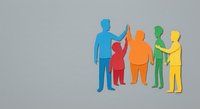 Colorful paper cut family silhouettes holding hands on gray background representing unity, diversity and togetherness in community support concept.