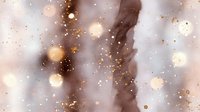 Abstract luxury background with flowing marble texture in soft beige and brown tones, decorated with gold glitter particles for elegant design projects.