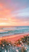 Serene coastal landscape at sunrise with soft pink and orange sky reflecting on calm ocean waves and sandy shore with coastal vegetation.