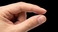 Isolated hand gesture showing small size measurement with thumb and index finger pinched together on transparent background, ready for design use on t-shirts, clipart, stickers, and print-on-demand products.