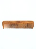 Wooden comb with fine teeth isolated on white background, suitable for hair care product design, grooming tutorials, and beauty packaging.