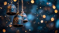 Ornate bronze bells hanging on chains with intricate patterns against sparkling bokeh lights background creating festive holiday atmosphere for celebrations.