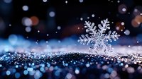 Delicate crystalline snowflake on sparkling surface with blue bokeh lights and falling snow creating magical winter atmosphere. Perfect for seasonal designs.