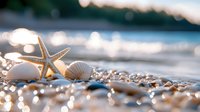 Golden starfish and seashells scattered on sandy beach shore with soft bokeh ocean waves and warm sunset lighting creating peaceful coastal atmosphere.