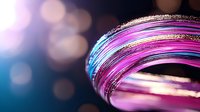 Vibrant swirling lines in pink and blue with glitter sparkles on dark background create dynamic abstract composition with soft bokeh light effects.