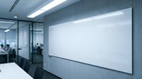 Modern office meeting room with large blank white projection screen on gray wall for business presentations and corporate training sessions.