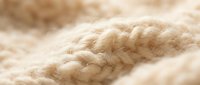 Natural beige rope texture with twisted fibers and soft lighting. Nautical marine cord detail for crafts, sailing, and rustic design projects.