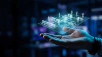 Businessman hand holding glowing holographic power grid model with electric towers, representing smart energy infrastructure and digital technology concept.