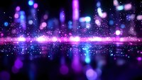 Magical purple and blue bokeh lights with glowing particles floating in dark space create dreamy atmosphere for fantasy or celebration backgrounds.