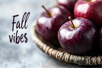 Fresh red apples in wicker basket with fall vibes text, autumn harvest concept for seasonal marketing, healthy eating and organic fruit advertising.