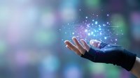 Business professional hand holding glowing digital network particles and light effects, representing technology innovation, data connectivity, and future digital transformation solutions.