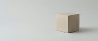 Minimalist beige cube on neutral background for modern design projects and geometric compositions.