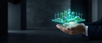 Businessman hand holding glowing green holographic smart city with buildings and wind turbines, representing sustainable urban development and green technology innovation.