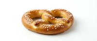 Fresh baked soft pretzel with coarse salt crystals on white background. Traditional German bakery snack for food service and restaurant menus.