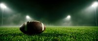 American football on green grass field under bright stadium lights at night for sports marketing and game day promotions.