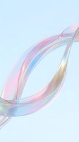 Abstract iridescent glass rings with rainbow reflections on soft gradient background for modern design projects.