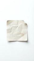 Crumpled cream colored paper isolated on white background, ready for design projects, packaging mockups, and creative compositions.