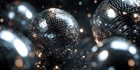 Shiny disco balls reflecting light with bokeh effect in dark nightclub atmosphere. Perfect for party, dance, nightlife, or celebration themes.
