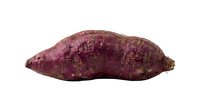 Purple sweet potato isolated on white background, ready for culinary, nutrition, and food design projects.