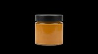 Glass jar with black lid filled with golden honey or spread, isolated on transparent background, ready for stickers, clipart, print on demand, and t-shirt design use.