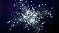 Glass explosion with sharp fragments scattered against dark blue background creating dramatic shatter effect for impact and destruction concepts.