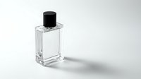 Clear glass perfume bottle with black cap on white background for cosmetic and fragrance product photography.