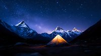 Illuminated camping tent glows against majestic snow-capped mountain peaks under starry night sky with purple aurora, creating magical outdoor adventure scene.