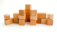 Natural wooden building blocks arranged in a pile on white background, showcasing various sizes and warm wood tones for educational toys and creative play.