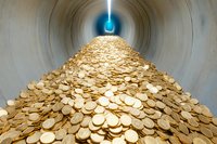Golden coins piled in concrete tunnel leading to bright blue light, creating dramatic perspective and wealth concept visualization for financial success.