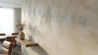 Modern minimalist dining room interior with marble textured wall, wooden furniture and natural lighting for contemporary home design.