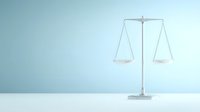 Minimalist white balance scale on light blue background with copy space, symbolizing justice, decision making and equilibrium in legal concepts.