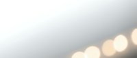 Soft bokeh lights on gradient gray background creating warm ambient atmosphere for modern design projects and presentations.
