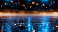 Abstract blue and orange bokeh lights creating dreamy atmosphere with sparkling particles and glowing orbs for festive backgrounds and celebrations.