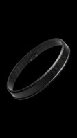 Black carbon fiber texture bracelet isolated on transparent background, ready for sticker, print on demand, T-shirt design, and clipart use.