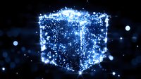Glowing blue cube shape formed by luminous particles and light effects against dark background, creating magical atmosphere for technology concepts.