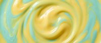 Creamy yellow and mint green swirled pattern with smooth flowing curves creating dynamic motion effect for backgrounds and decorative designs.