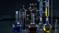 Laboratory glassware with colorful chemical solutions and molecular structure model for scientific research and education experiments.